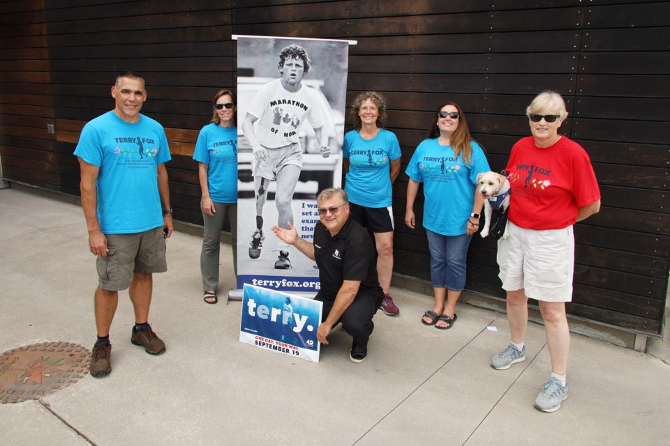 Local Terry Fox Run organizers Debbie Fletcher-Queen, Muriel Lee, Bob Hackenbrook, Laurie Osborne, and Tanya Hackenbrook with Newmarket Councillor Bob Kwapis.  Greg King for NewmarketToday