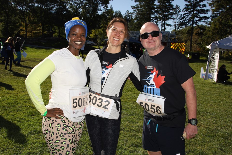 Flo, Violeta, and Allan are enjoying a sunny but chilly morning for the inaugural Run for Newmarket at Fairy Lake Oct. 2 organized by the Newmarket chapter of the Ahmadiyya Muslim Youth Association.  Greg King for NewmarketToday