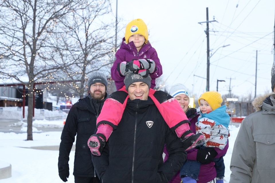 Joshua Campbell and daughter Maeve walk in the Coldest Night of the Year for Inn From the Cold Feb. 25 in Newmarket, helping to raise a record-breaking $157,313 to date.  Greg King for NewmarketToday
