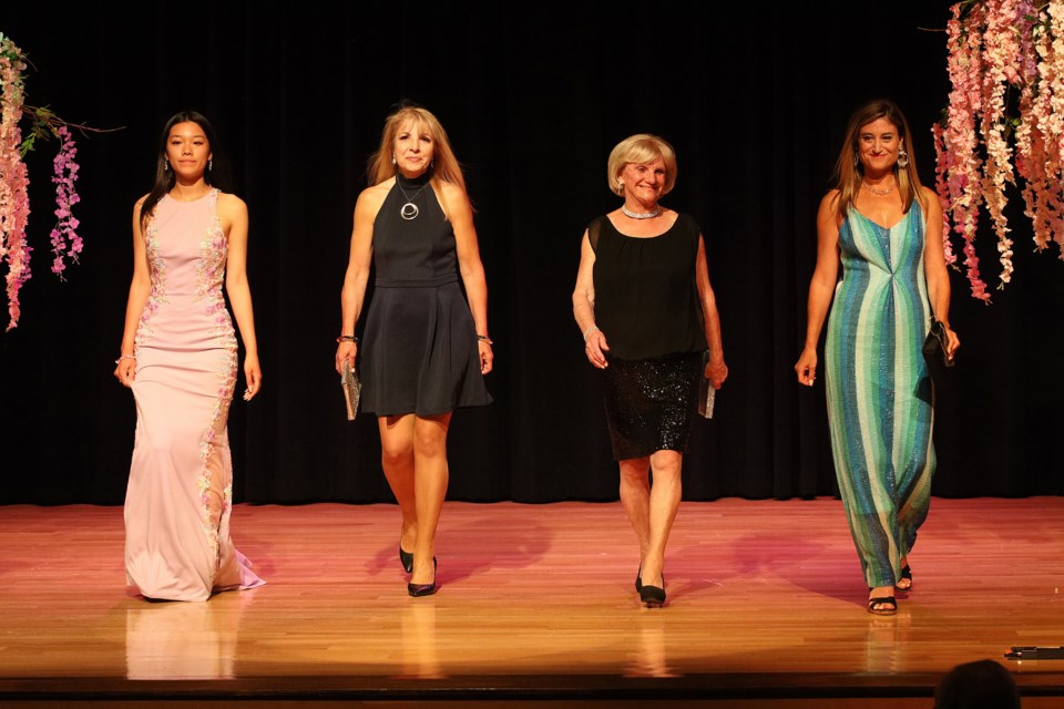 Hunter Kim, Angela Vegh, Jackie Playter, and Global News reporter Caryn Lieberman take to the runway for Designing Hope last night at the Old Town Hall in Newmarket in support of Abuse Hurts. Greg King for NewmarketToday