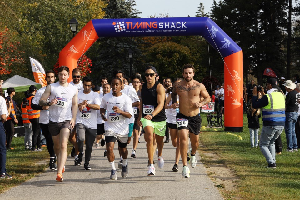 The runners take off for the 2nd annual Run for Newmarket hosted by the Newmarket chapter of the Ahmadiyya Muslim Youth Association Oct. 1 in support of CHATS and the York Region Food Network.  Greg King for NewmarketToday