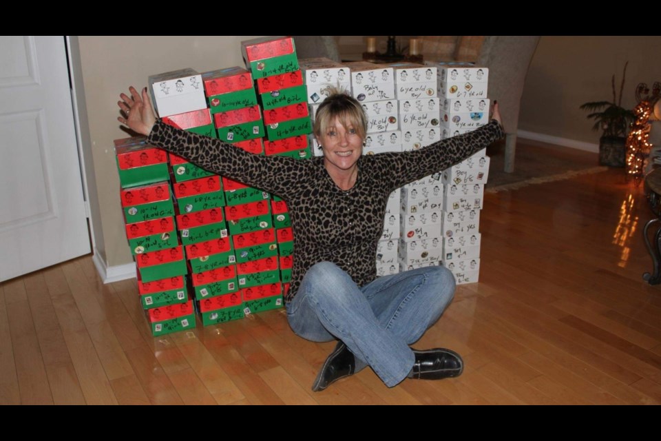 Volunteer Heather Wilson Gonsalves has donated over 1,000 shoeboxes to Operation Christmas Child in the past 12 years.