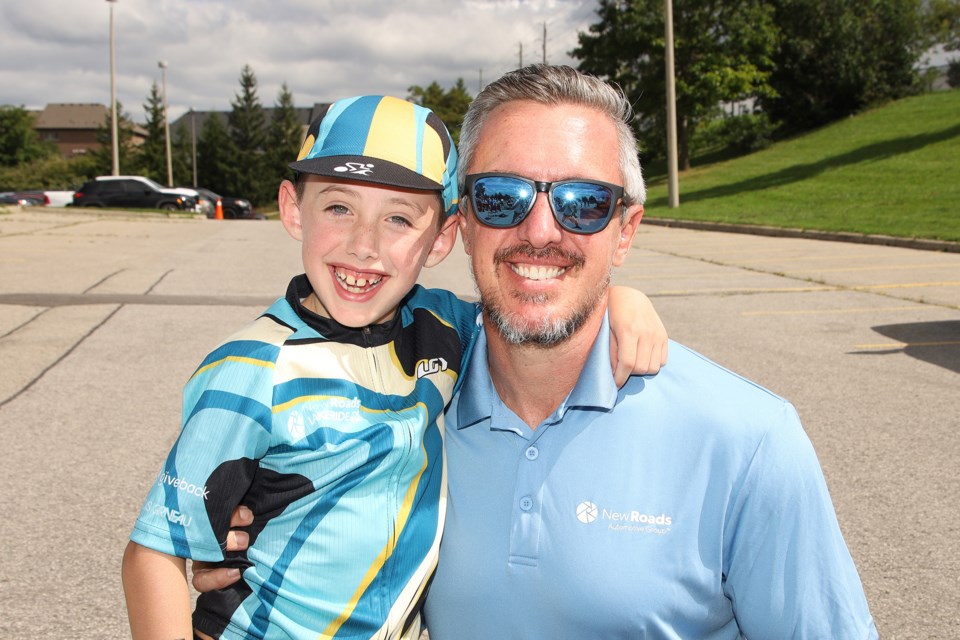 Ben Tobin, with dad Jordan, cycled 20 km and raised $1,904 in Sunday's 8th annual NewRoads Lake Ride in support of Southlake Regional Health Centre.  Greg King for NewmarketToday