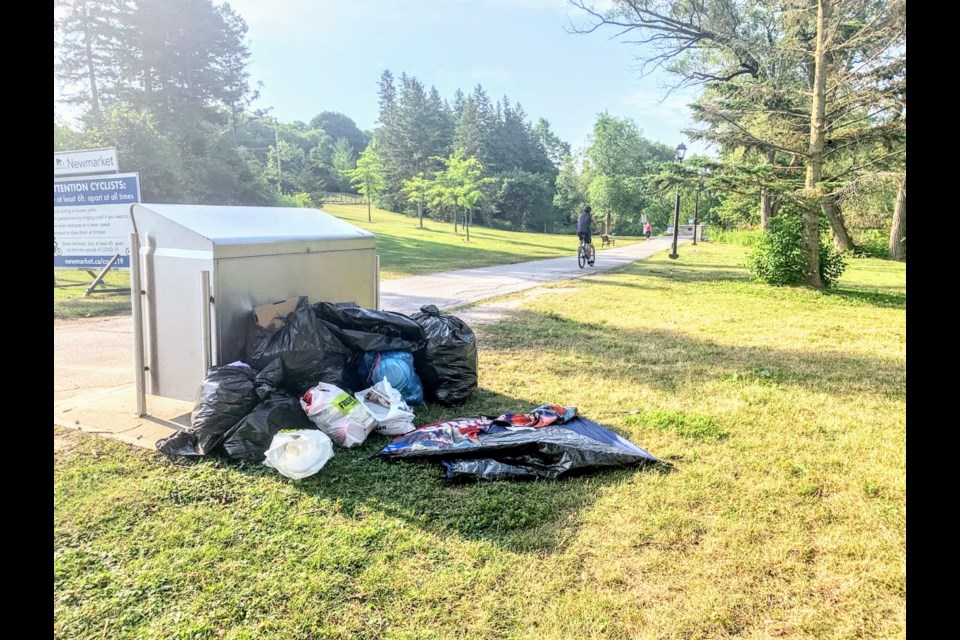 Garbage bins at Fairy Lake are overflowing on Sunday, July 19. Suzan Challis for NewmarketToday