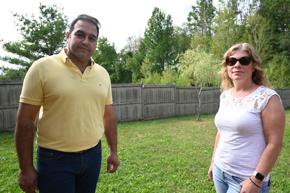Arash Banisadr and Kimberley Lafreniere are among neighbourhood residents concerned about the apartment development proposed near Bathurst and Davis.