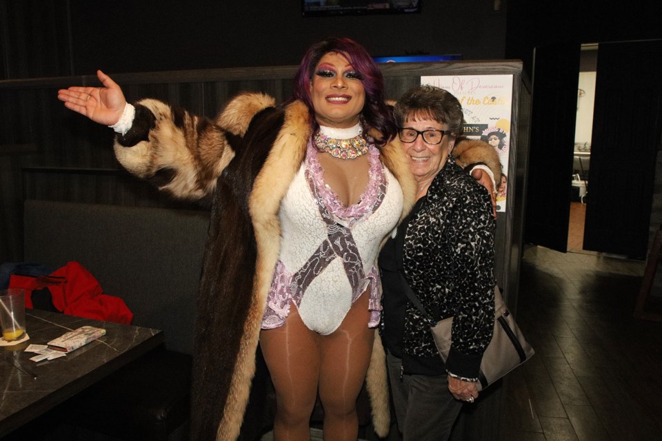 Fan Carol Edwards, 82, was delighted to attend the Haus of Devereaux Queens of the Castle drag show at Castle John's in Newmarket Saturday night. Here she is with Carmen Del Rae.  Greg King for NewmarketToday