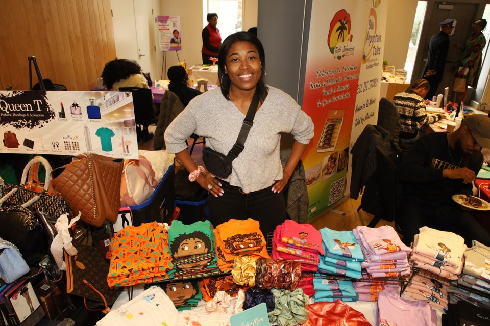 Tajia Niles brought the clothing she produces for Black children under the label "Indy Mindy" to the Black History Month reception at the Old Town Hall Feb. 4. Greg King for NewmarketToday