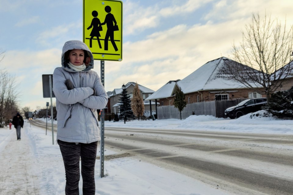 Terry Fox Public School parent Erin Ford says the relocation of the school's crosswalk on Sawmill Valley Drive in September poses safety concerns for the children, as well as the crossing guard. Kim Champion/NewmarketToday