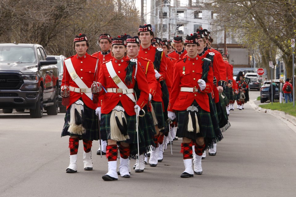The 142nd St. Andrew's College Highland Cadet Corps march through Aurora for the annual church parade to Trinity Anglican Church for a service in memory of graduates who died in military service.