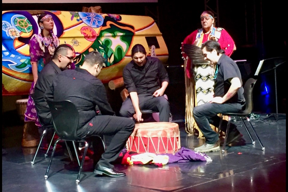 Jacob Charles and the Charging Horse Drummers, Cedar Smoke (left) and Suzanne Smoke take part in Sacred Heart CHS's Sacred Canoe Launch March 19 at St. Andrew's College. Debora Kelly/NewmarketToday