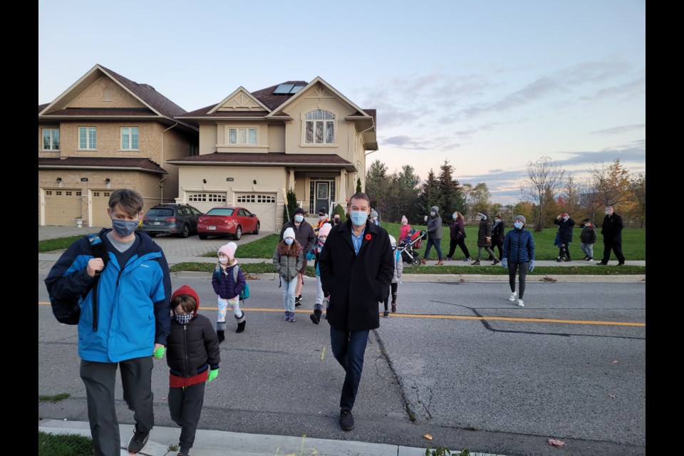 Mayor John Taylor joins students from Notre Dame Catholic Elementary School this morning to end International Walk to School Month.