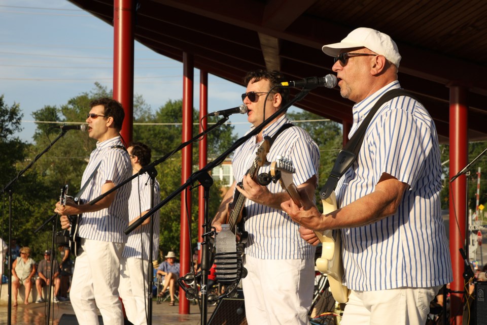 The Beach Party Boys, a Beach Boys tribute band, features Newmarket's own Jeff Scott (left) at Newmarket's TD Music Series last night at Riverwalk Commons.  Greg King for NewmarketToday