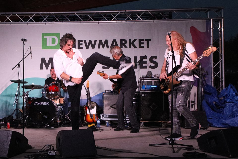 The Blushing Brides' lead singer Maurice Raymond — who teased the Newmarket audience for being 'docile' — has all the Mick Jagger moves at the final concert in the 2023 TD Music Series at Riverwalk Commons last night.  Greg King for NewmarketToday