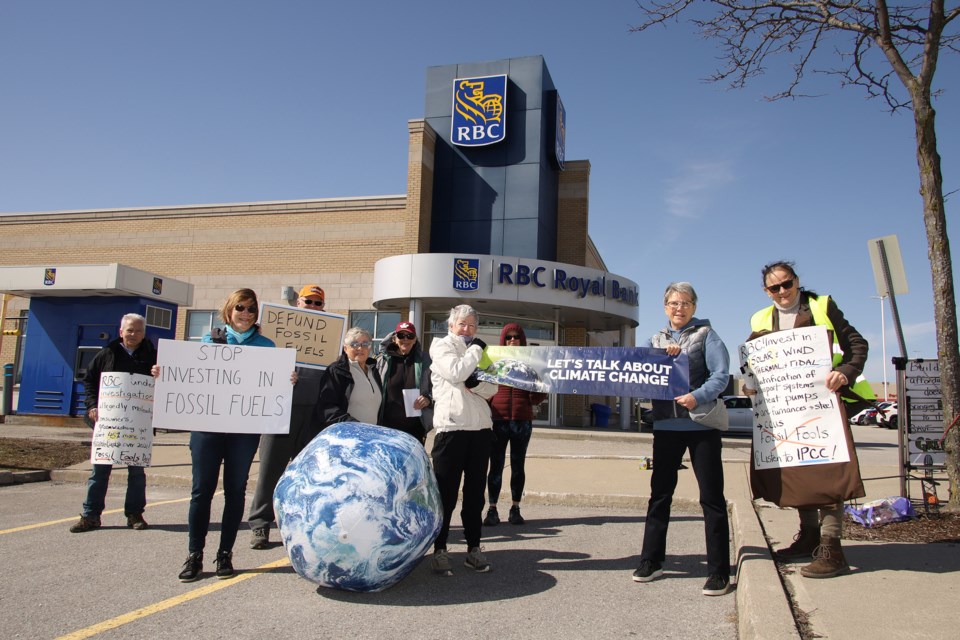 Local climate activists gathered in front of the RBC at Yonge and Dawson Manor for Fossil Fools Day on April to protest RBC's investments in fossil fuels.  Greg King for NewmarketToday