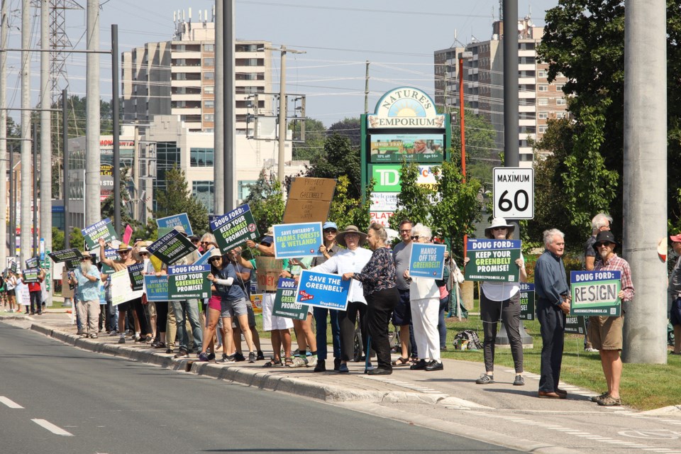 Protesters line up along Yonge Street in Newmarket in this file photo.