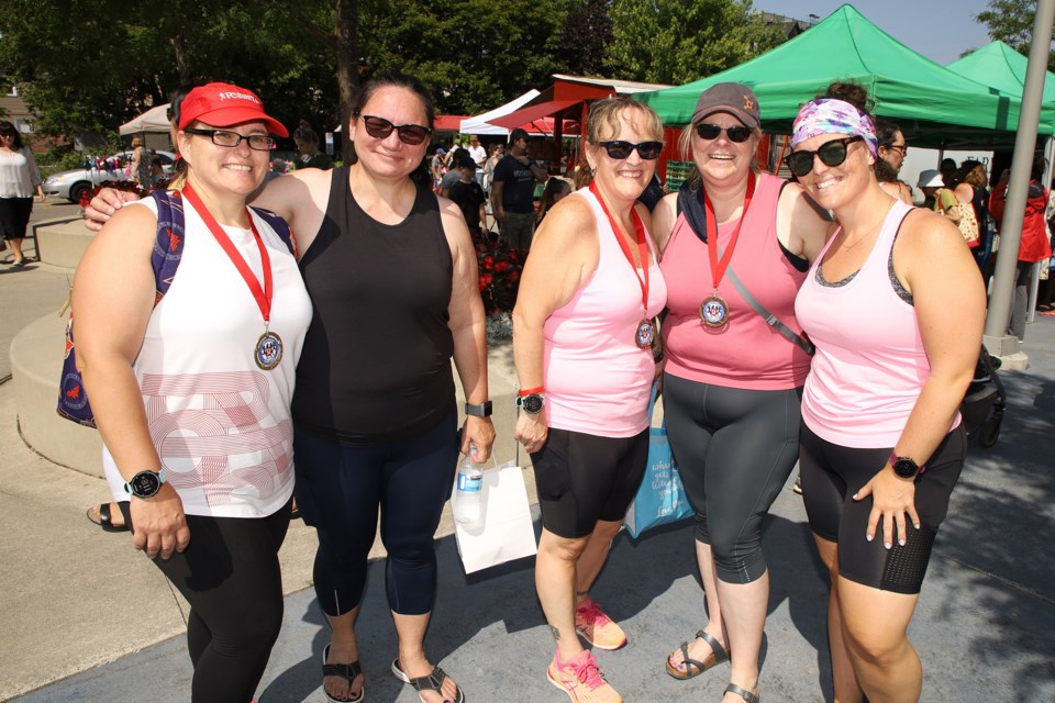 Since the Unity Relay didn't issue medals; Stacy Ruble, Angela Jong, Gillian Hanlon, Erin Wood, and Jacklyn Grossi made their own.  Greg King for NewmarketToday