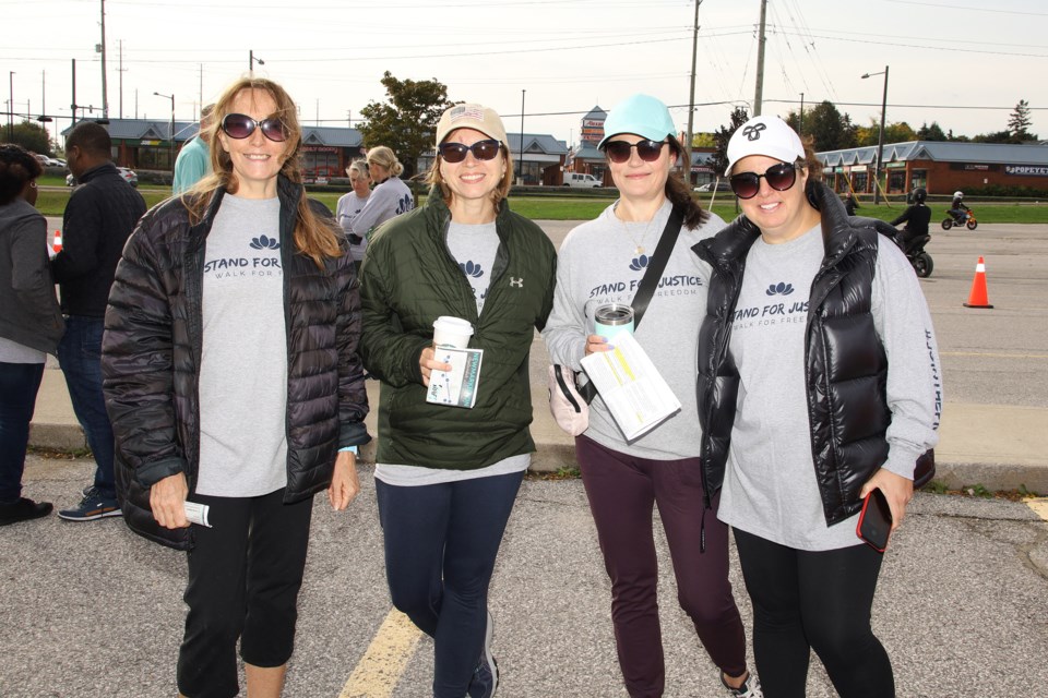 Barbara Hill, Lisa Mihelcic, Andrea Paszna, and Lisa Nanmoski take a stand for justice at Newmarket's Walk4Freedom Sept. 25.  Greg King for NewmarketToday