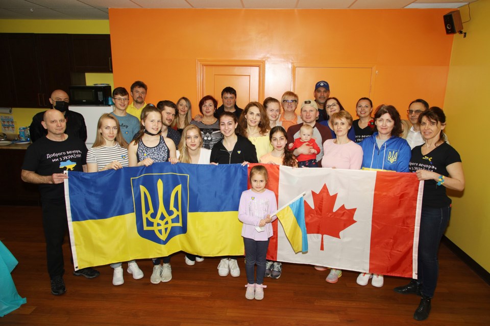 Tatiana Rolinsky (centre, in yellow) invited friends and family to join the Latin dance event at Gymalaya in Newmarket help her raise funds to send to Ukraine.  Greg King for NewmarketToday