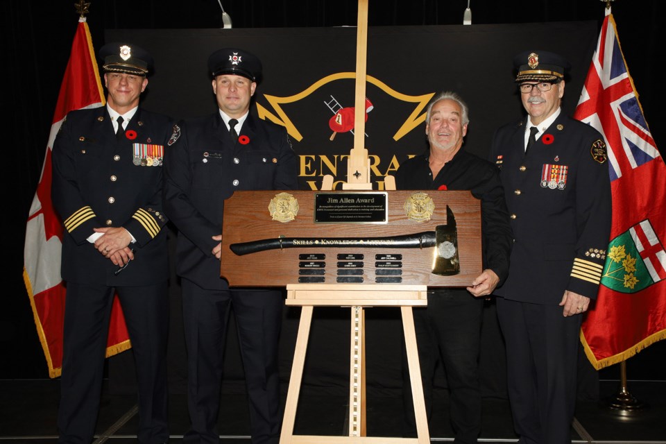Assistant Deputy Chief Claude Duval (left), with the winner of the 2023 Jim Allen Award Acting Capt. Phil Montgomery, along with Jim Allen, and Fire Chief Ian Laing at the annual Central York Fire Services recognition ceremony Nov. 9.