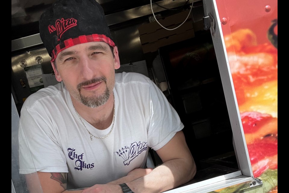 Akos Pataki offers handcrafted pizzas, and now sourdough bread and scones, from A's Pizza food truck.