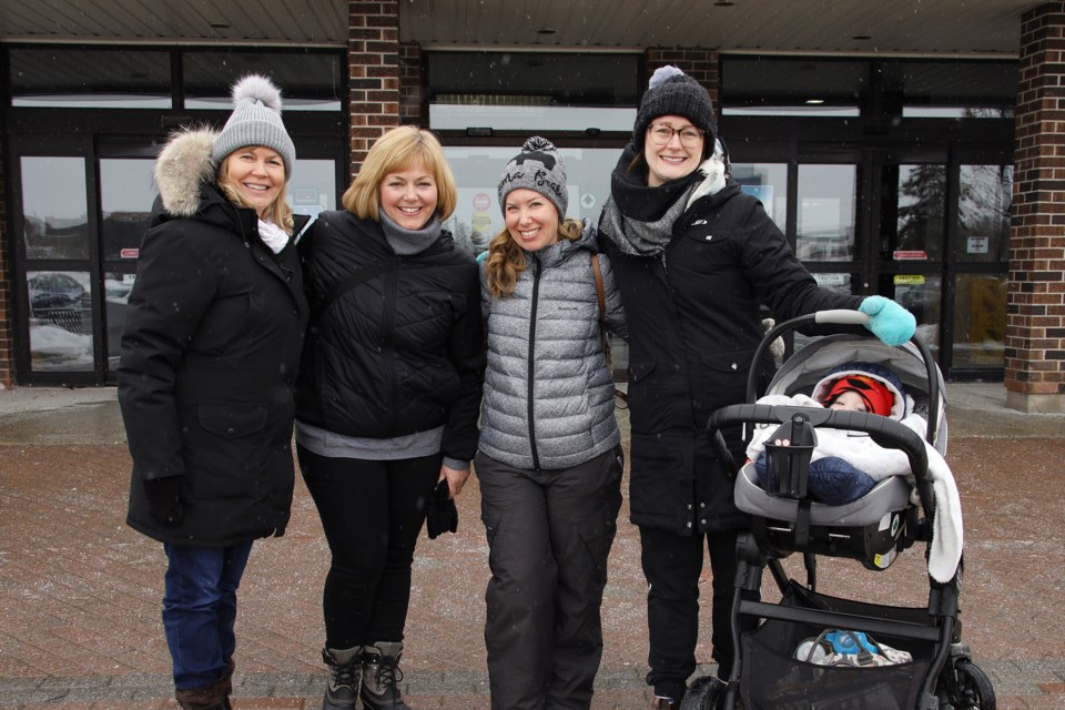Tracy Spring, Deanna Reily, Courtney Gedeon, and Katie Koruna, with her son, Mason, start their weekly Newmarket Walk for Mental Health group walk from the Ray Twinney Complex.  Greg King for NewmarketToday