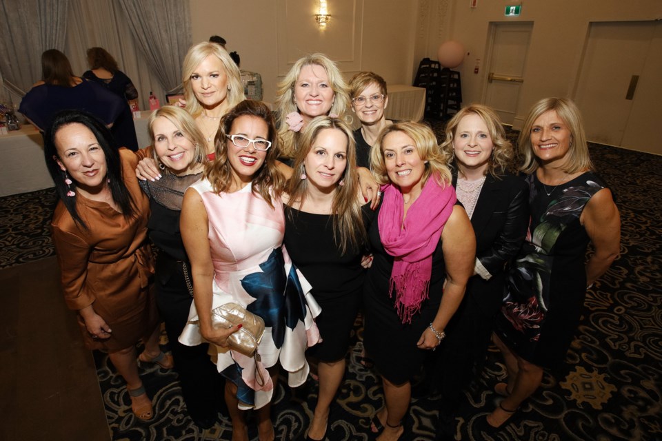 Juliane Goyette (back row, centre) is shown here with her posse on Feb. 29 at Dragonfly Wellness's Splash of Pink gala in support of women affected by cancer held at the Royal Venetian in Aurora.  Greg King for NewmarketToday