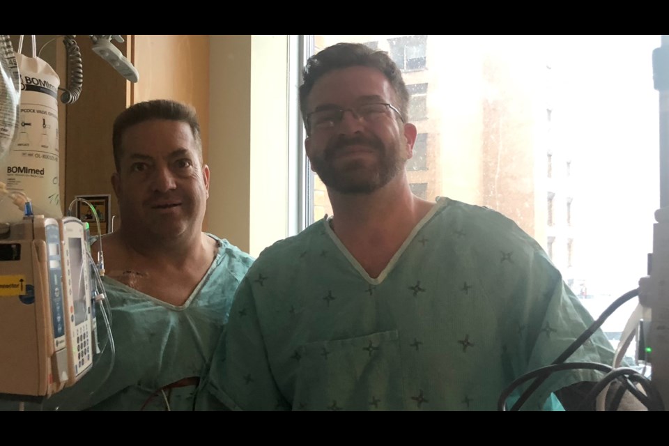 David Holland (right) donated a kidney to his brother, Mike, in March of this year. 
