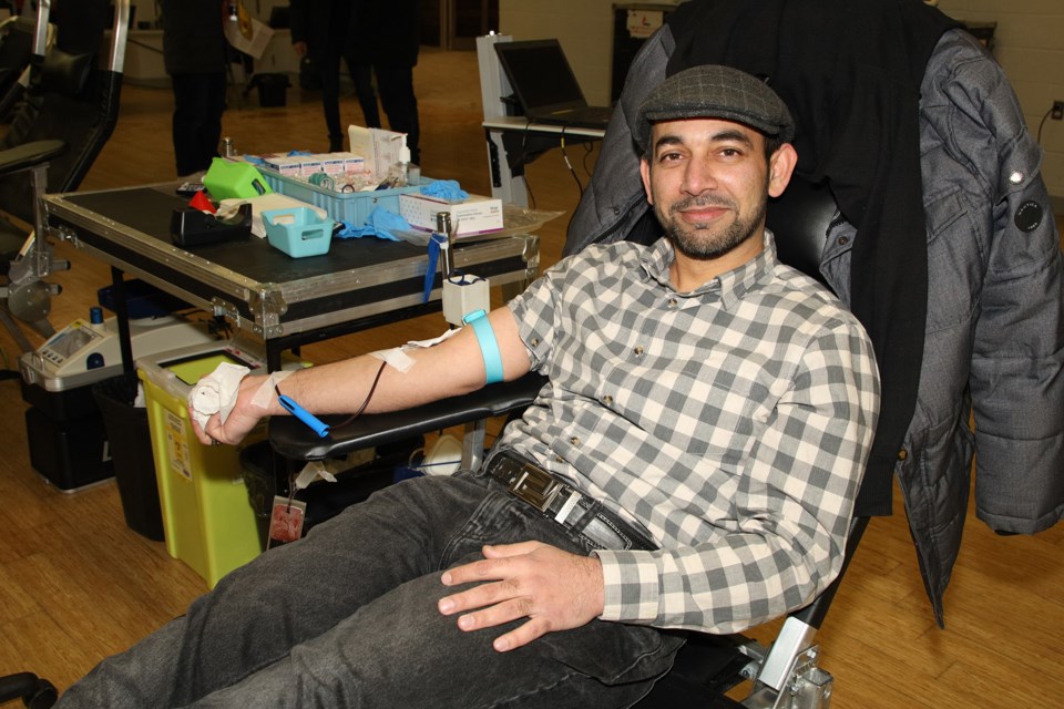 Kash Meer donates blood at a drive hosted by the Ahmadiyya Muslim Youth Association's Newmarket chapter at the Newmarket Community Centre Saturday. Greg King for NewmarketToday