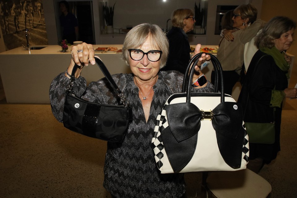 Barbara Allan won two of the raffle purses at the first annual Handbags for Hospice last night at the Aurora Armoury in support of Margaret Bahen Hospice and Doane House Hospice in Newmarket. 