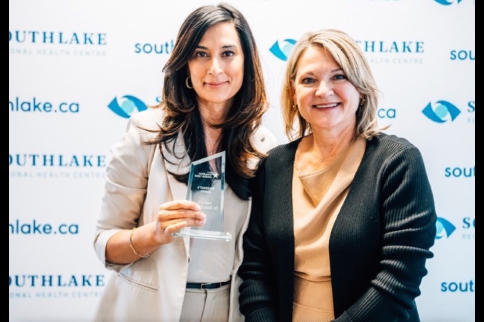 Dr. Alisha Kassam, shown with Arden Krystal, president and CEO of Southlake Regional Health Centre, received the first President's Award during Southlake's Champion Awards ceremony.