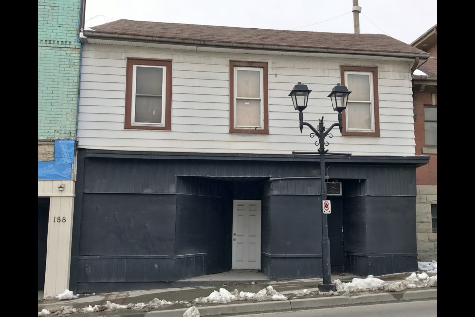 The historic Charles Hargrave Simpson building on Main Street has been boarded up and neglected.