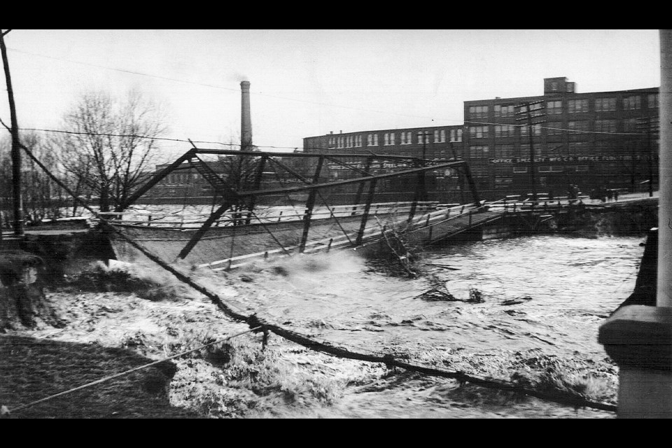 The Holland River caused flooding in Newmarket during Hurricane Hazel in 1954, here on Timothy Street with the Office Speciality factory in the background. 