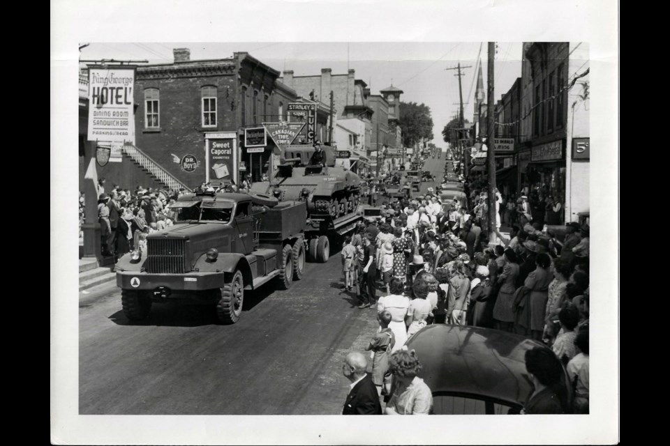 Following the Second World War, the regiment became an armoured unit and was equipped with Canadian-made Ram II tanks. Here, they parade down Main Street Newmarket.