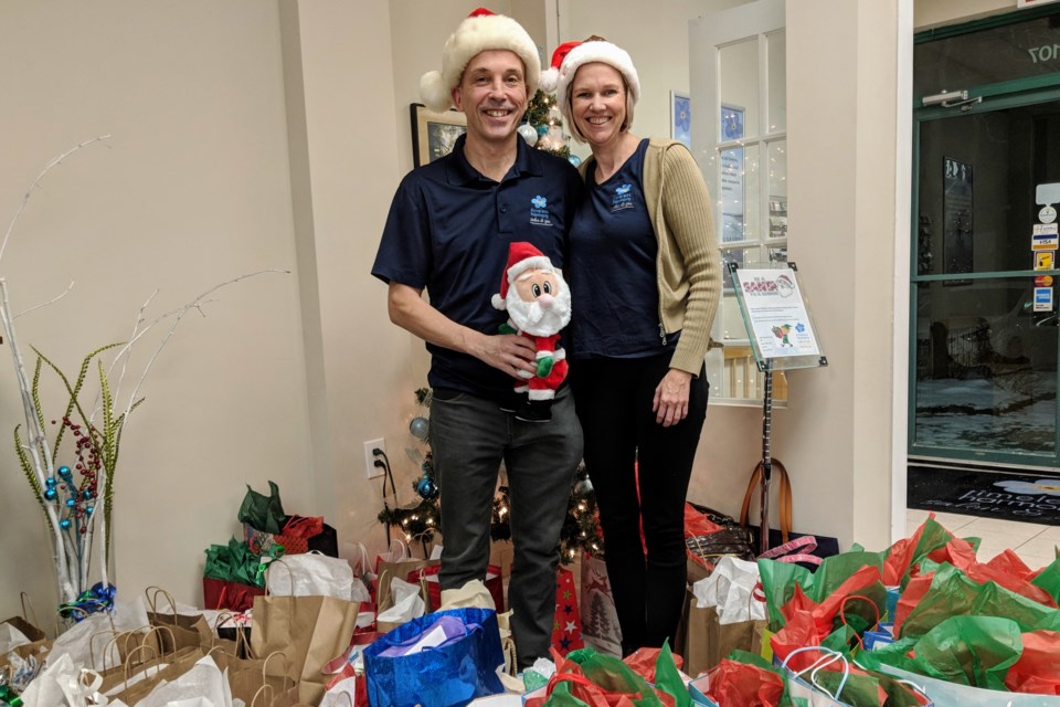 Husband and wife team Katie Gilligan and Mike Vasiliou are shown here in December 2018 during the first Be a Santa to a Senior campaign. Kim Champion/NewmarketToday