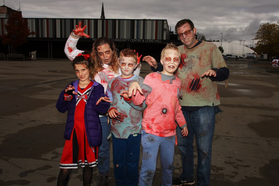 Jen and Dave Heikamp's zombie family: Brooke, Michael, and Matthew took part in the fundraising Zombie Walk for St. John Ambulance Sunday, Oct. 31 at Riverwalk Commons.  Greg King for NewmarketToday