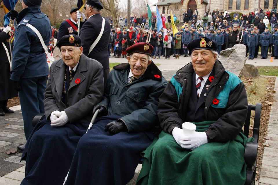 Veterans Edward Beniston, Wilf O'Hearn and Jeff Reynolds are VIPs at Newmarket's Remembrance Day ceremonies held Nov. 10.  Greg King for NewmarketToday