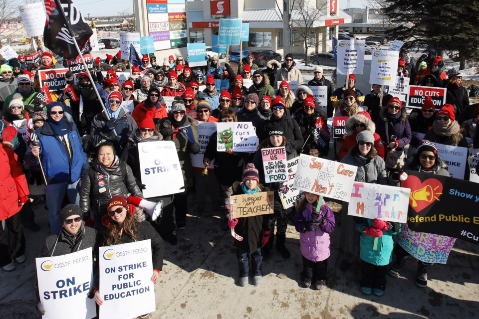 More than 100 people from the Newmarket community joined the demonstration Feb. 21 in support of striking teachers and education workers.  Greg King for NewmarketToday