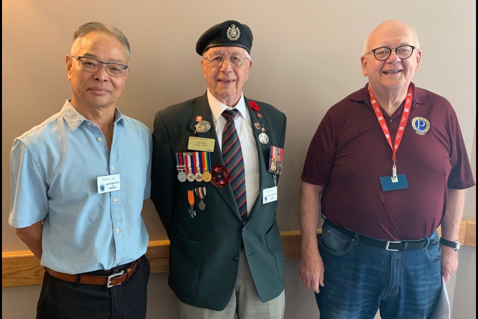 The Men's PROBUS Club of Newmarket paid tribute to Second World War veteran and longtime club member Jim Parks (centre), here with president Sunny Lau and member Doug Wigglesworth. Debora Kelly/NewmarketToday