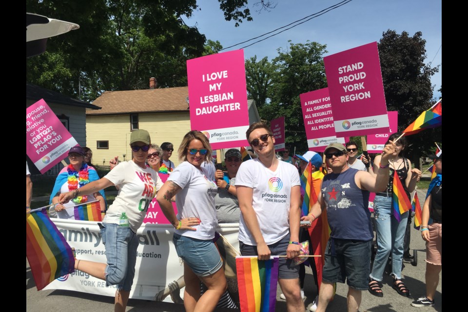 Pflag York Region volunteers are shown here at a 2018 pride month celebration. Supplied photo