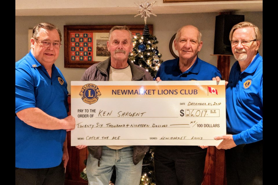 The Newmarket Lions Club has lost crucial fundraising sources, like its Catch the Ace lottey, says Rick Metcalfe (second from the right.) File photor/NewmarketToday