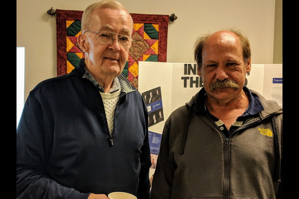 Longtime Inn from the Cold supporter Tom Taylor (left) and Inn from the Cold client, Steve Koteff at last night's open house at the Newmarket shelter. Kim Champion/NewmarketToday