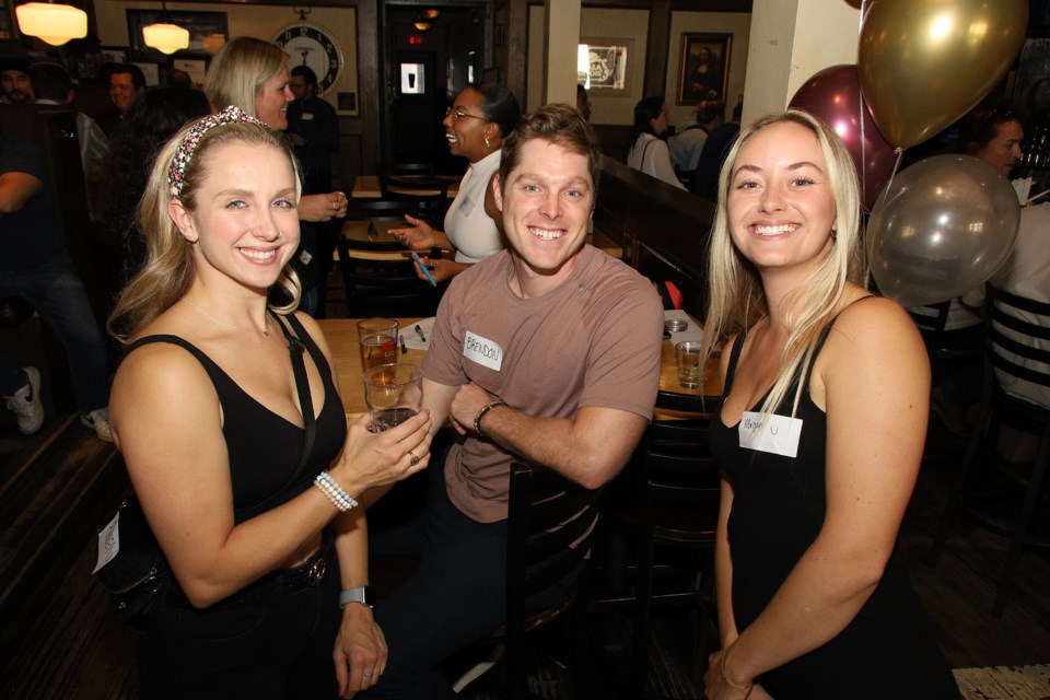 Raven Carruthers, Bendon McNaughton, and Morgan McKinnon of Huron Heights Secondary School Class of 2013 joined the reunion at the Olde Village Inn on Main Street Newmarket Saturday.  Greg King for NewmarketToday