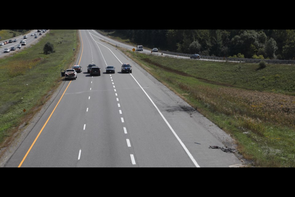 The scene about an hour following a cyclist fatality on Hwy. 404 this afternoon. Photography by Kevin Lamb