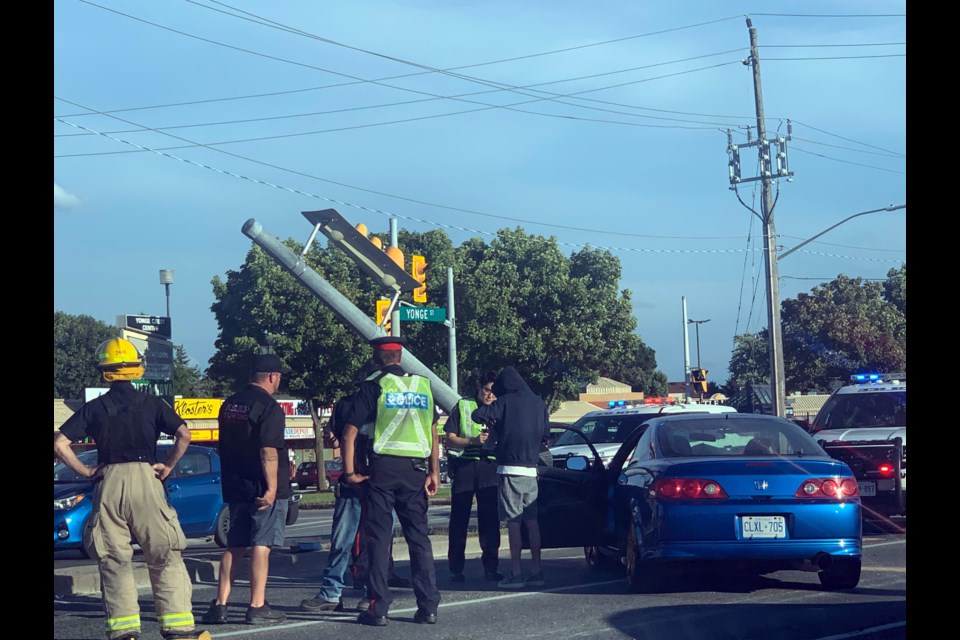 A traffic signal pole was knocked down in a single-vehicle collision on Yonge Street, with traffic reduced to one lane south of the SilverCity plaza. Contributed photo/Courtney Challis