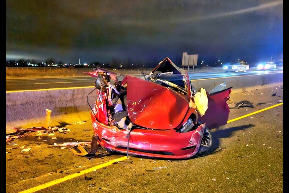 A transport truck collided with a vehicle stopped in a live Highway 400 lane early Saturday, Dec. 16.