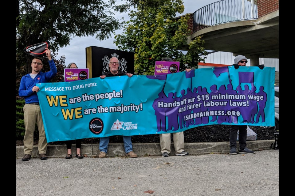 Members of the Ontario Federation of Labour and Fight for $15 and Fairness protest in Aurora earlier this month. Kim Champion/NewmarketToday
