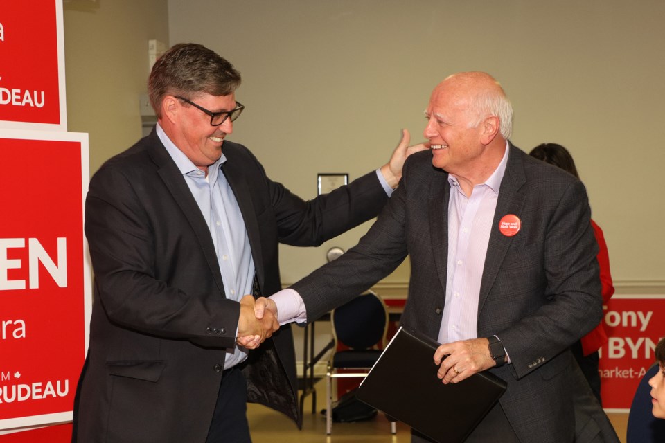 Outgoing Newmarket-Aurora Liberal MP Kyle Peterson congratulates Tony Van Bynen on being acclaimed the Liberal Party candidate in July 2019.  Greg King for NewmarketToday