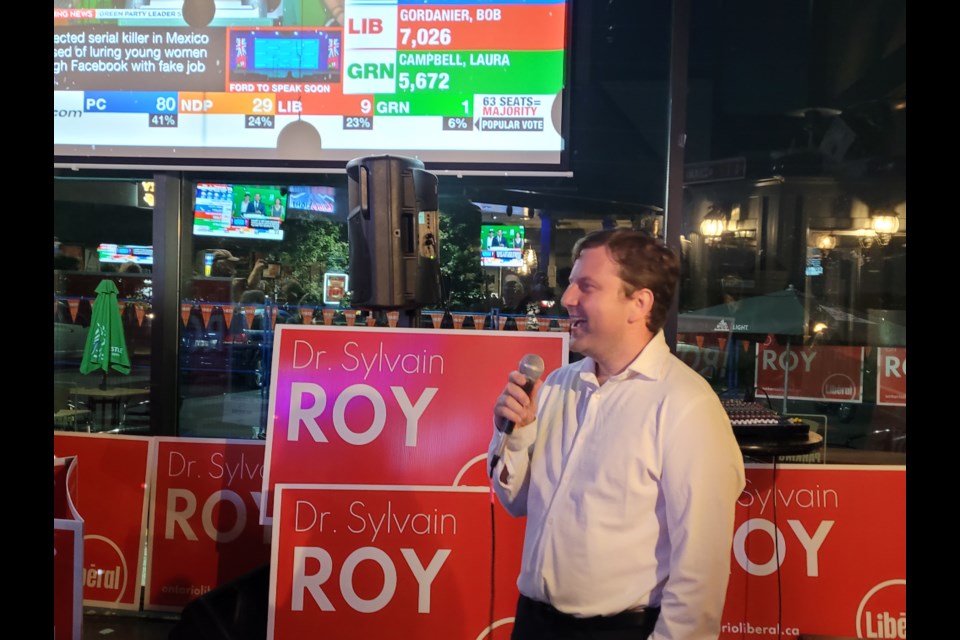 Sylvain Roy speaks to supporters at the pub after hearing the results. 