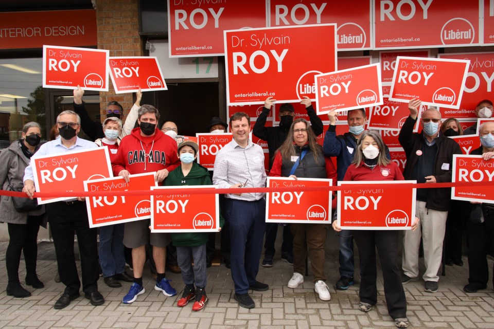 Candidate Dr. Sylvain Roy and the Newmarket-Aurora Liberals cut the ribbon for their campaign office at 1100 Gorham St. May 1. Greg King for NewmarketToday