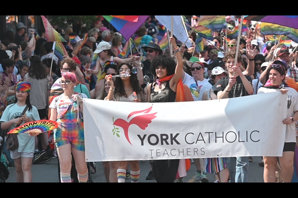 York Catholic District School Board teachers received loud applause as one of the contingents of the York Pride parade June 17 in Newmarket.